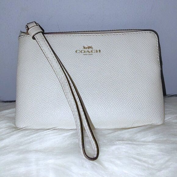 Coach Handbags - Coach Cream Textured Wristlet
